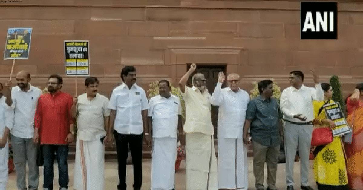 Opposition MPs form human chain outside Parliament to protest against Adani issue
